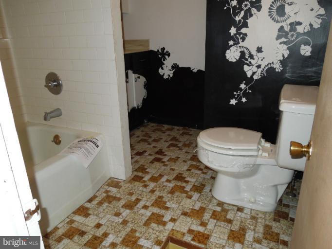 953 Pine Grove Road Bluemont, VA 20135 - Photo 24 of 25 a bathroom with a sink toilet and shower