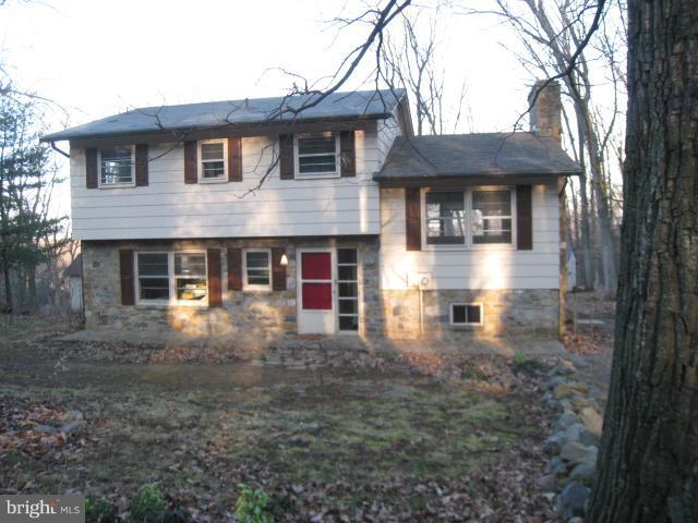 953 Pine Grove Road Bluemont, VA 20135 - Photo 25 of 25 a front view of a house with yard