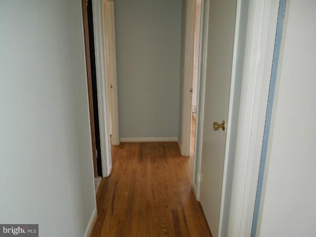 953 Pine Grove Road Bluemont, VA 20135 - Photo 5 of 25 a view of a hallway with wooden floor