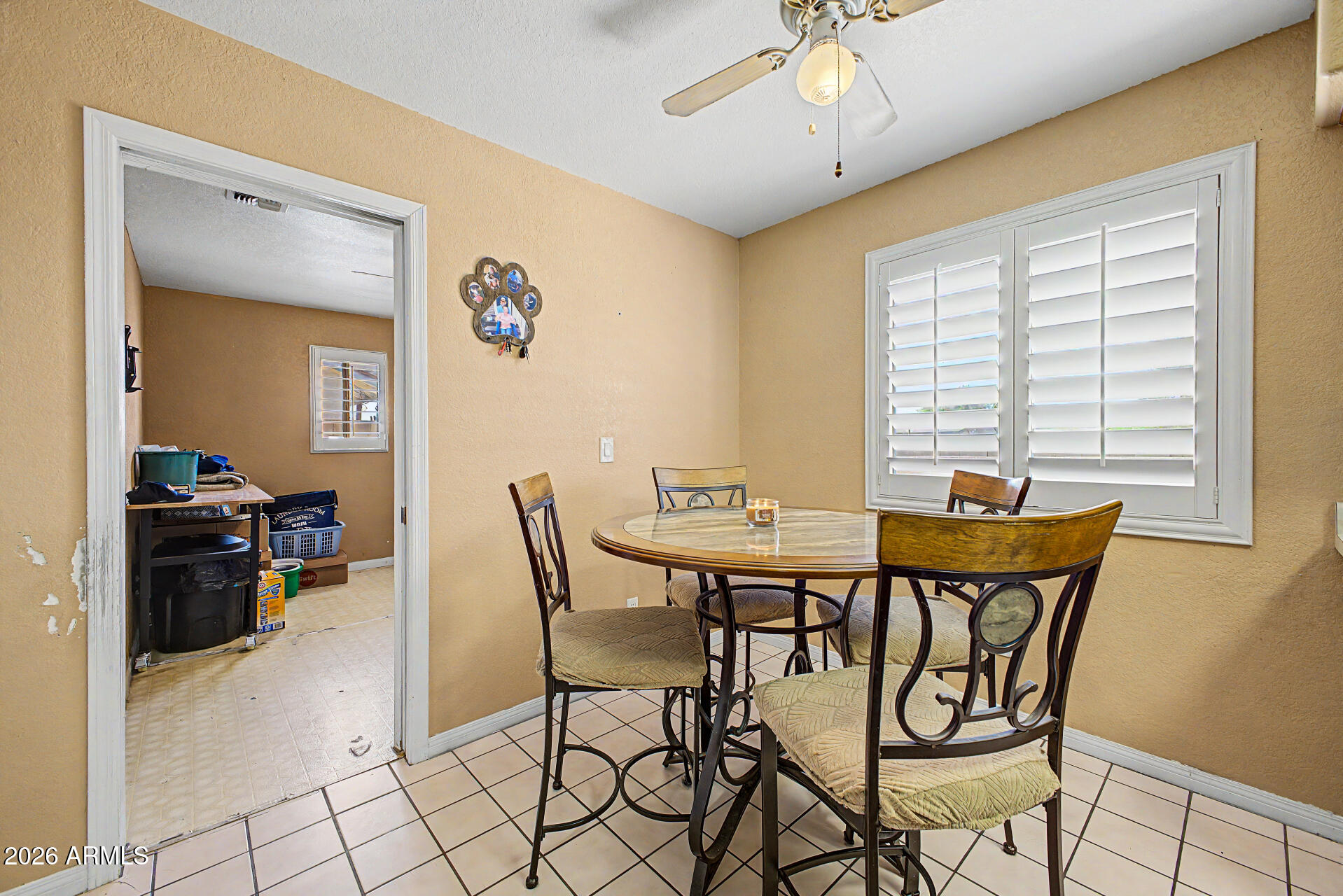 660 South Stardust Lane Apache Junction, AZ 85120 - Photo 7 of 15 a view of a dining room with furniture and a chandelier