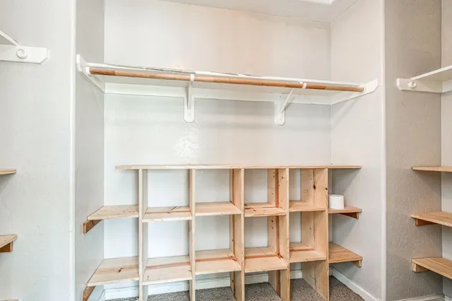 a view of a room with rack on the wall