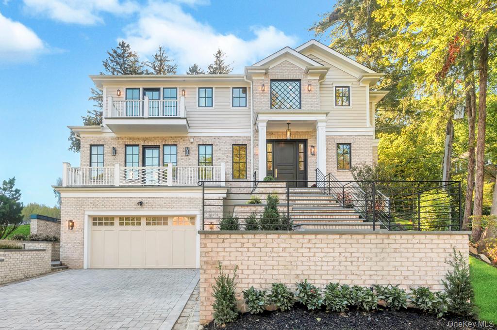 112 Chapel Road Manhasset, NY 11030 - Photo 1 of 1 a front view of a house with a yard