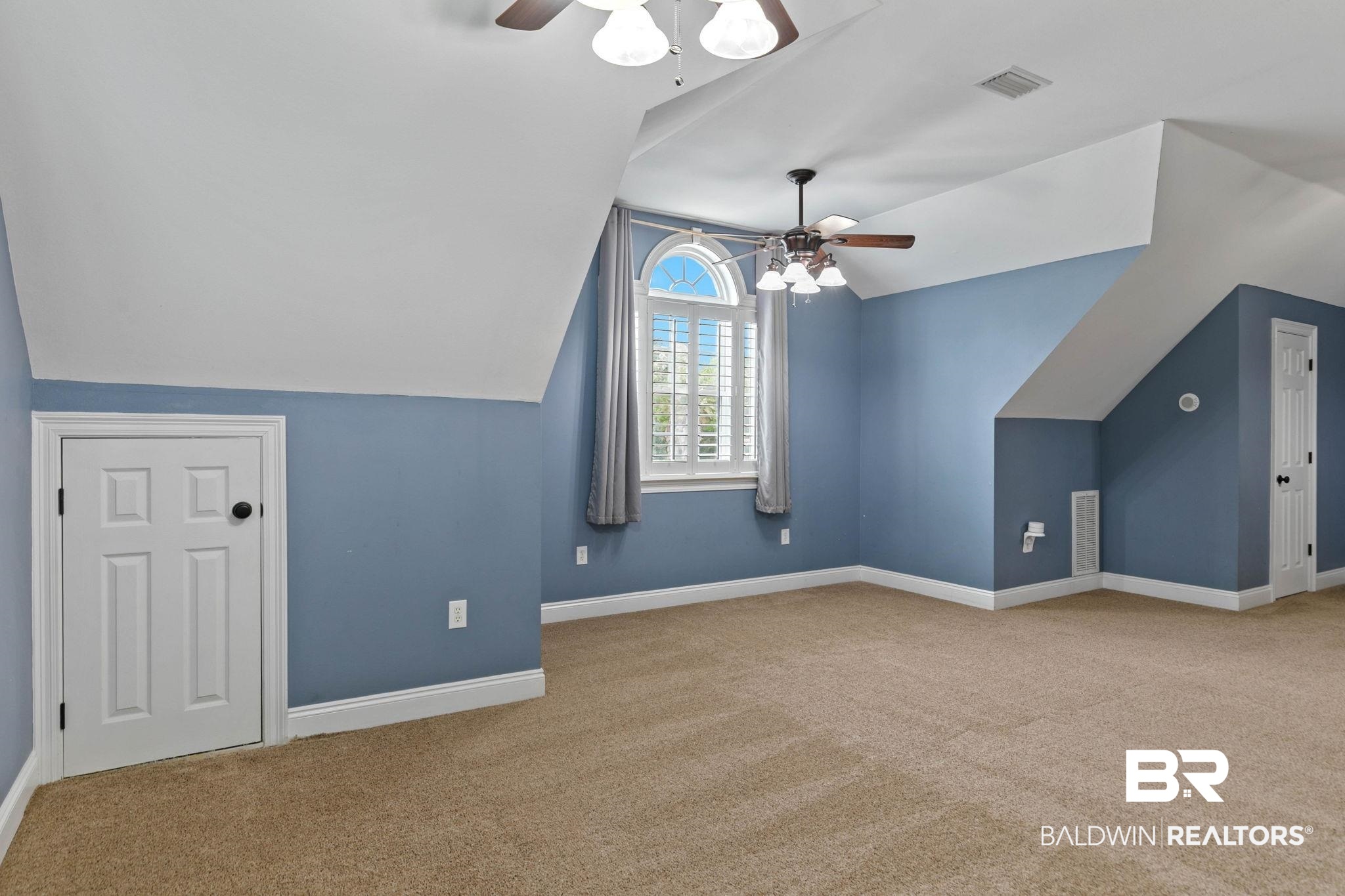 3668 Claridge Road North Mobile, AL 36608 - Photo 71 of 100 Bonus room featuring ceiling fan, light colored carpet, and lofted ceiling