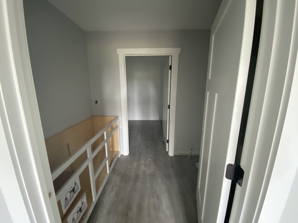 105 Switchboard Road Portland, TN 37148 - Photo 4 of 6 a view of an empty room and wooden floor