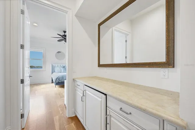 a kitchen with counter top space cabinets and appliances