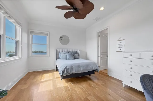 a kitchen with stainless steel appliances granite countertop a sink and a refrigerator