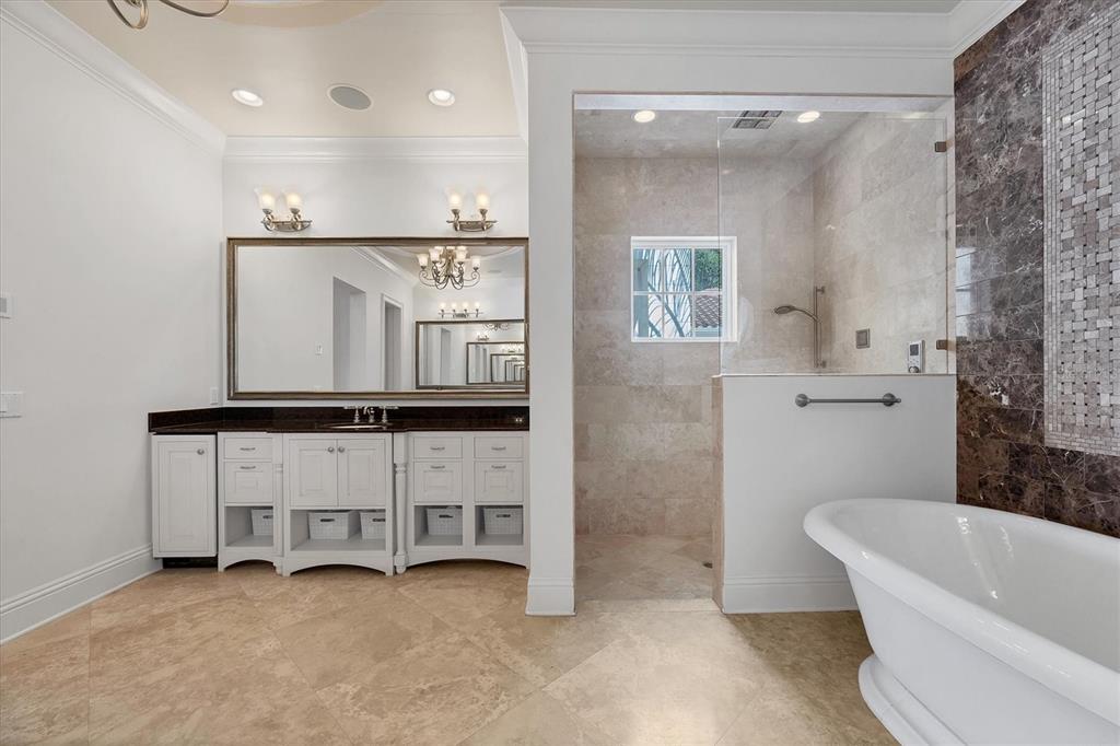 730 Sarabay Road Osprey, FL 34229 - Photo 44 of 95 a bathroom with a tub sink and mirror