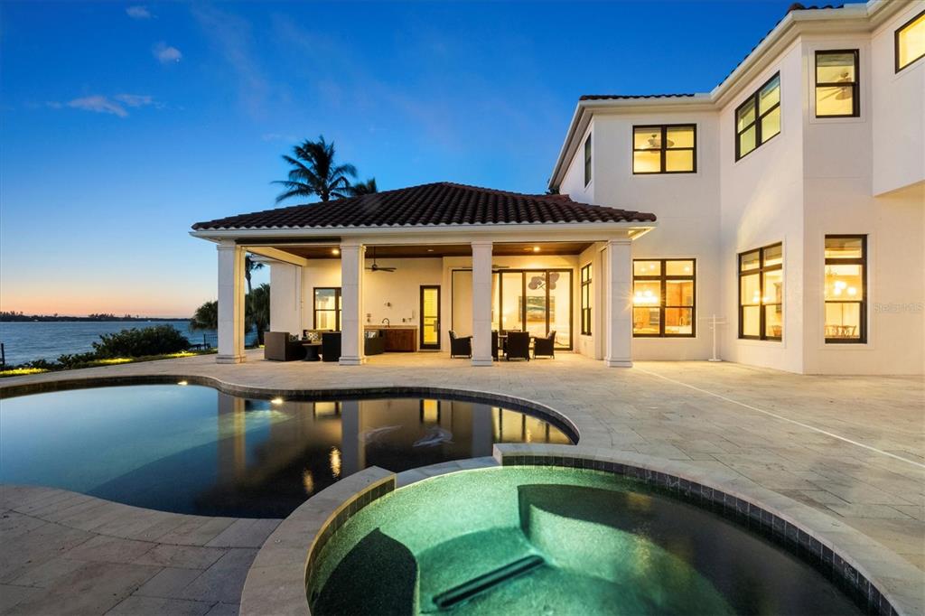 730 Sarabay Road Osprey, FL 34229 - Photo 85 of 95 a view of a house with swimming pool and sitting area