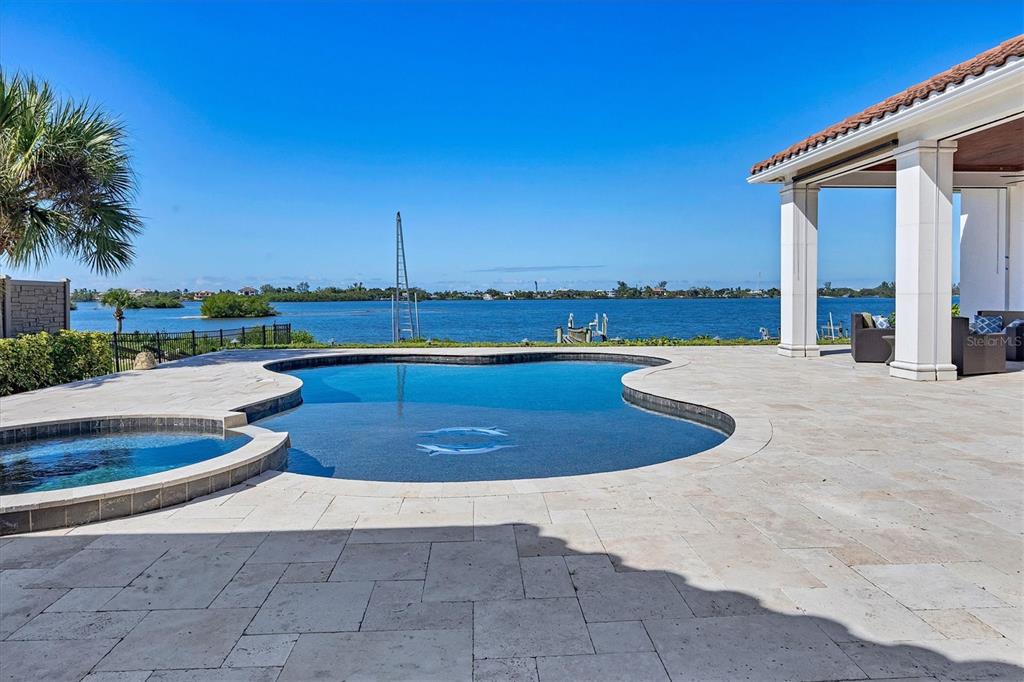 730 Sarabay Road Osprey, FL 34229 - Photo 10 of 95 a view of a swimming pool with a lounge chairs