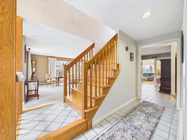 a view of an entryway and livingroom