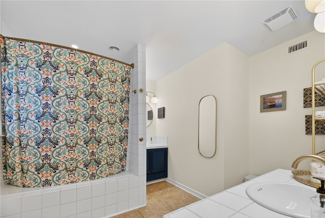 609 Peerman Place Corpus Christi, TX 78411 - Photo 25 of 36 a bathroom with a shower