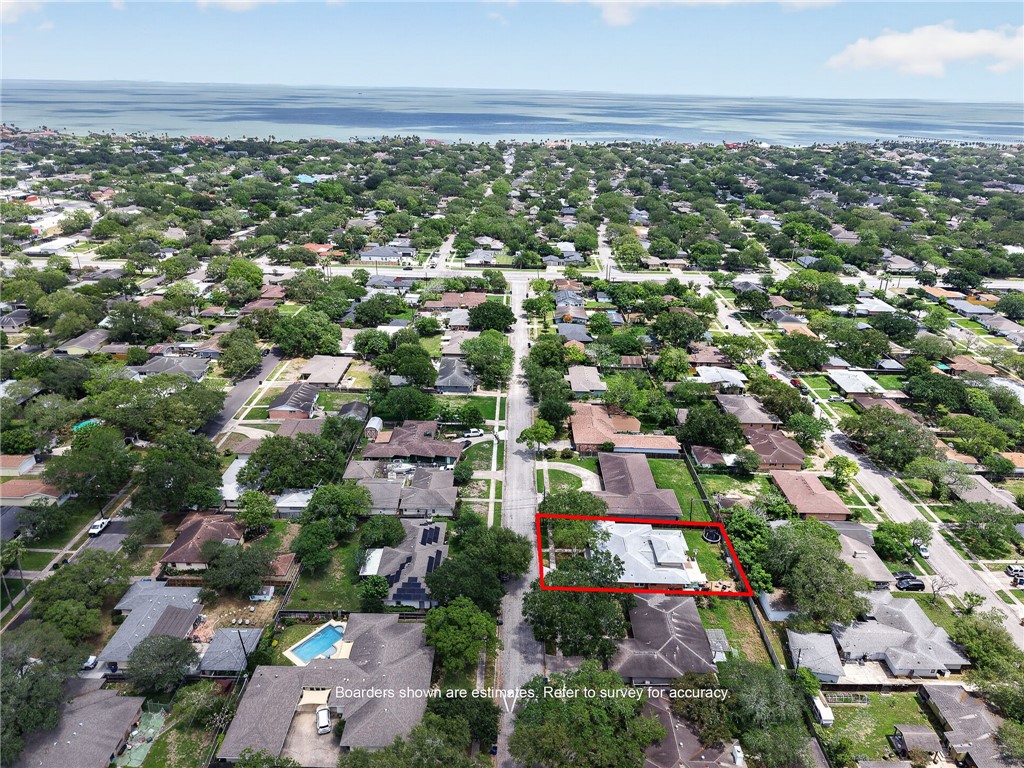 609 Peerman Place Corpus Christi, TX 78411 - Photo 33 of 36 an aerial view of residential building with green space
