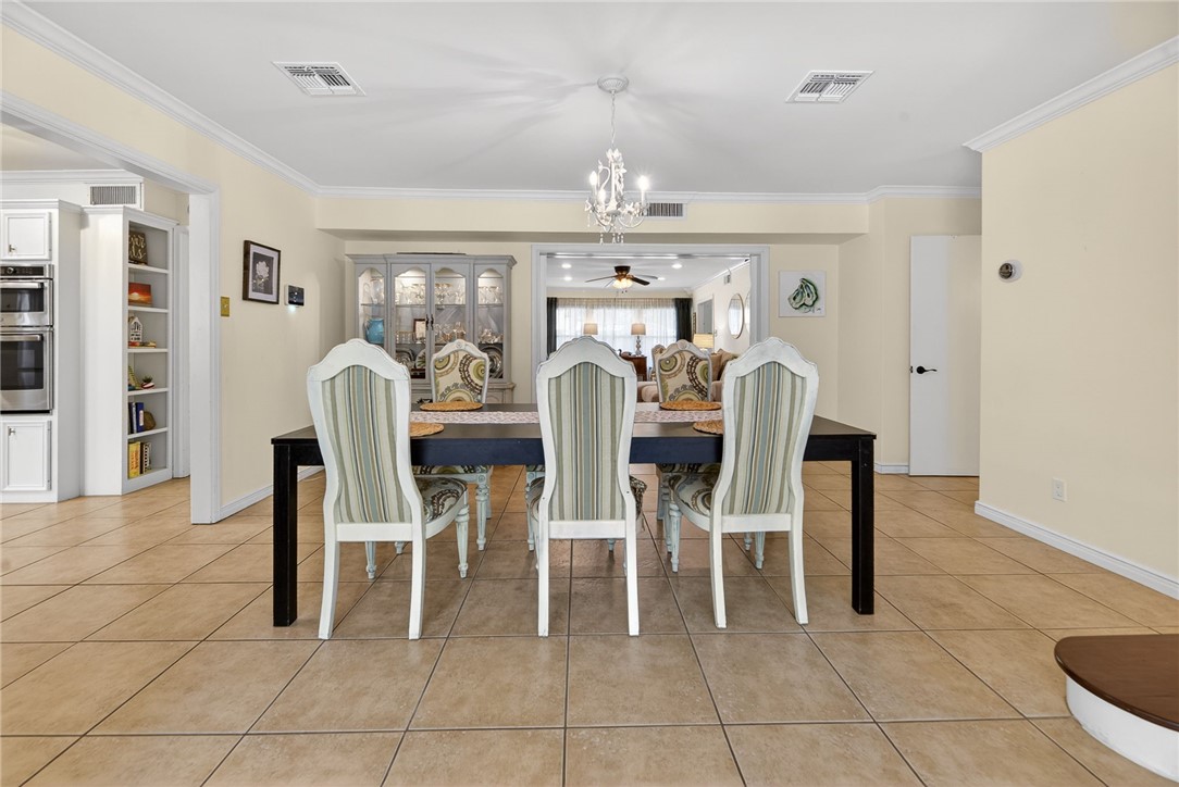 609 Peerman Place Corpus Christi, TX 78411 - Photo 8 of 36 a view of a dining room with furniture