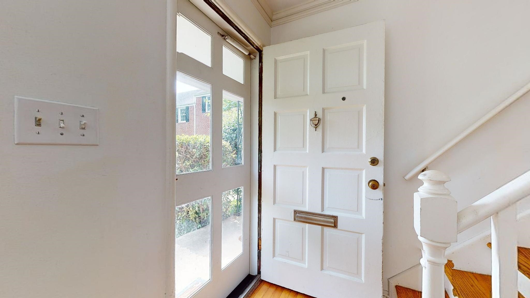 845 Bryan Street Raleigh, NC 27605 - Photo 8 of 31 Lots of natural light through this heavy duty storm door.