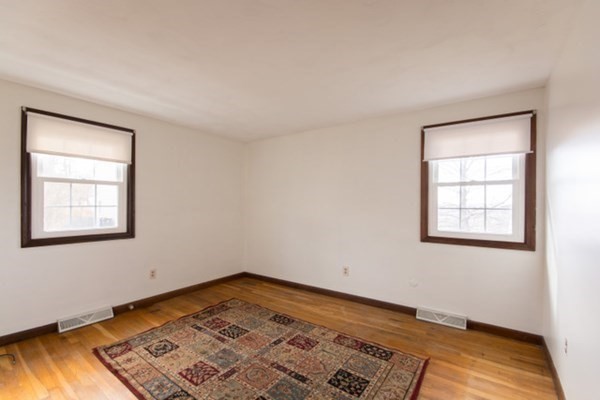 320 Quincy Street Fall River, MA 02720 - Photo 13 of 21 a view of an empty room and window