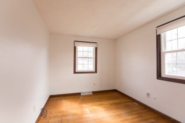 320 Quincy Street Fall River, MA 02720 - Photo 15 of 21 an empty room with a window