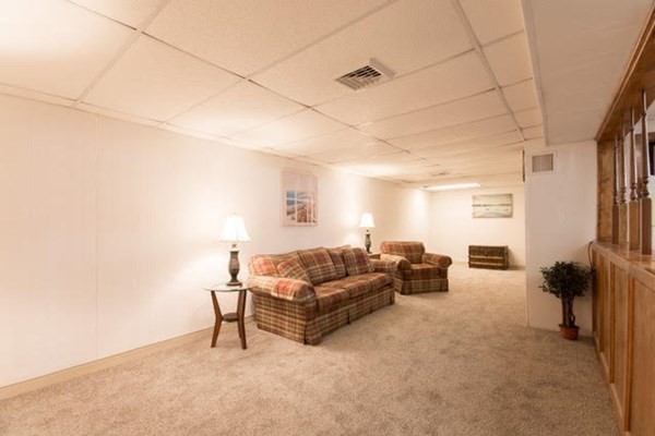 320 Quincy Street Fall River, MA 02720 - Photo 16 of 21 a living room with furniture and a couch