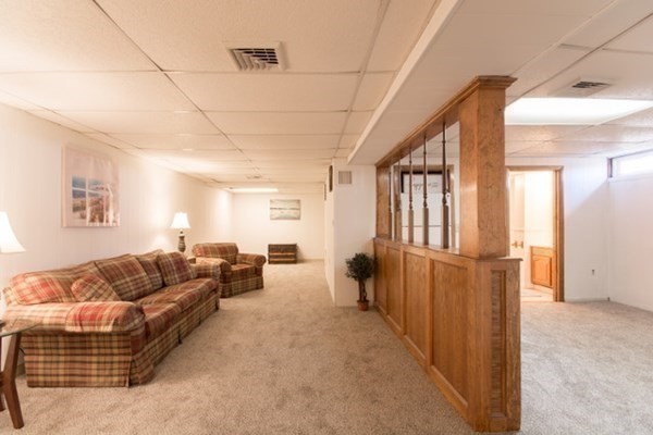 320 Quincy Street Fall River, MA 02720 - Photo 17 of 21 a living room with furniture and a open entryway