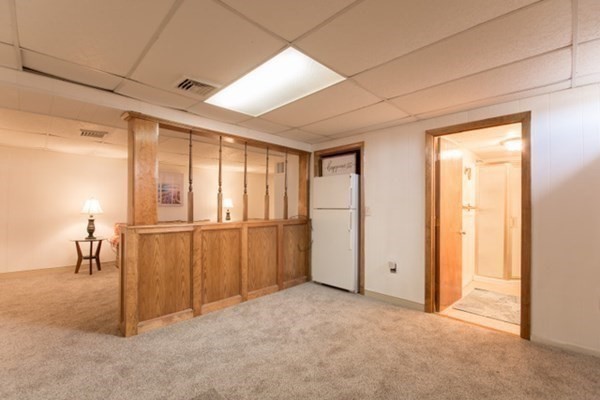320 Quincy Street Fall River, MA 02720 - Photo 19 of 21 a view of a livingroom with a fireplace