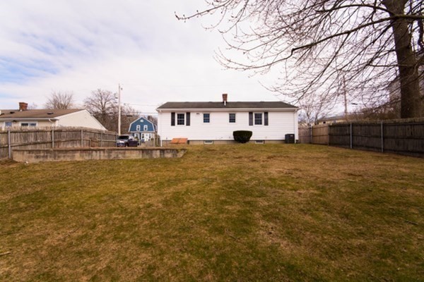 320 Quincy Street Fall River, MA 02720 - Photo 3 of 21 a house view with swimming pool in front of it