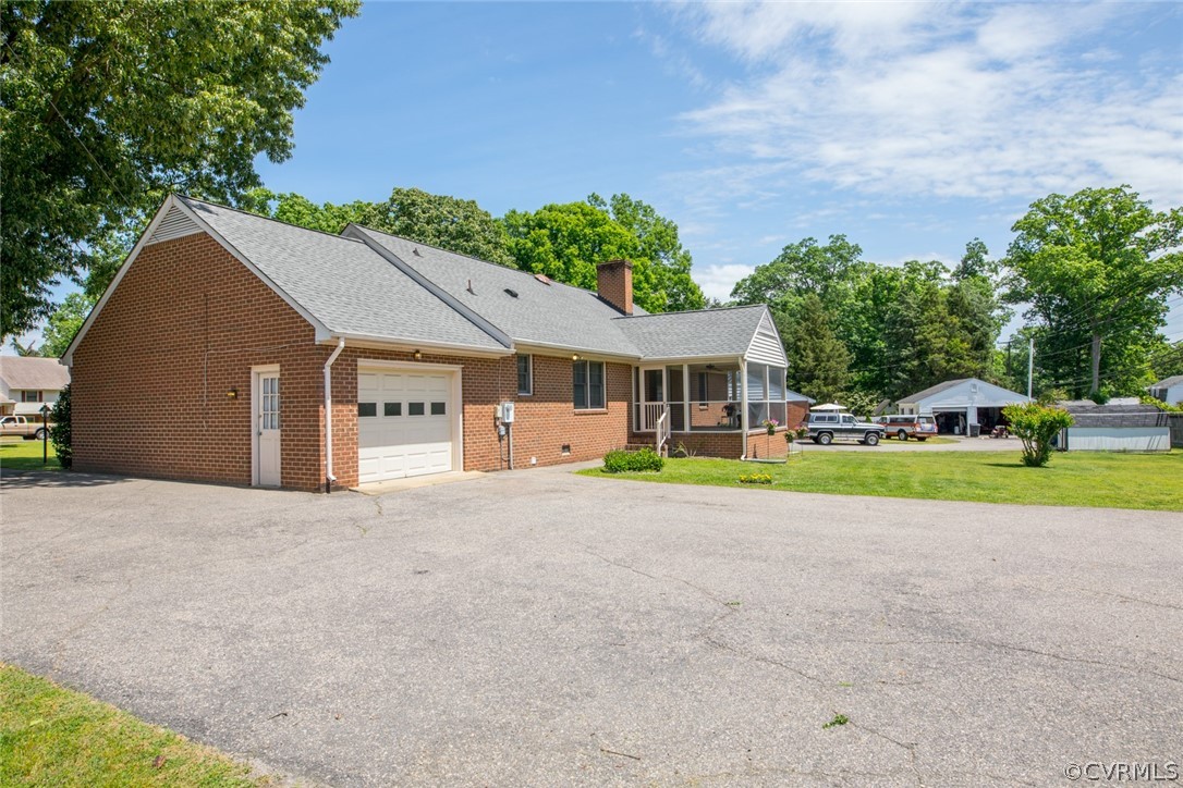 5101 Hopkins Road North Chesterfield, VA 23234 - Photo 34 of 37 a front view of house with yard and green space