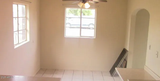 a kitchen with a sink a stove and a refrigerator