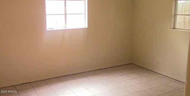an empty room with a window