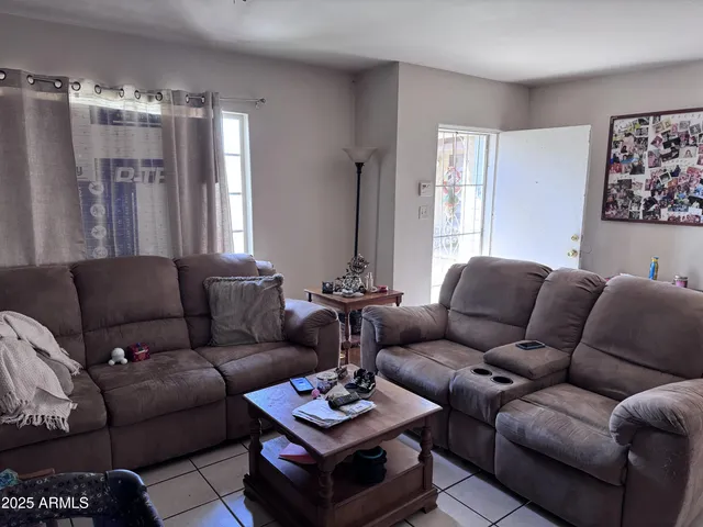 a kitchen with a sink appliances and cabinets