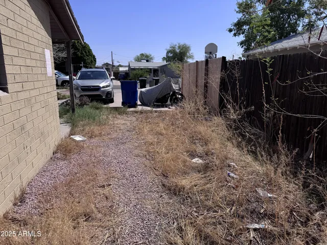 a view of a door and chair in the balcony
