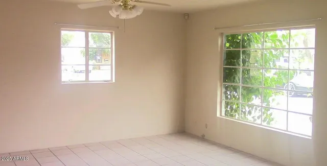 an empty room with windows