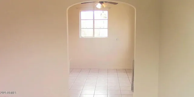 a kitchen with a sink stove and a refrigerator