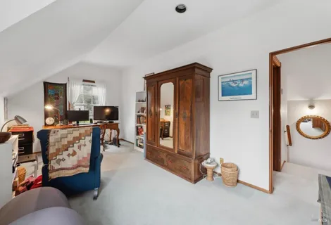 a backyard of a house with barbeque oven