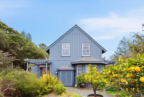 a kitchen with stainless steel appliances granite countertop a stove and a refrigerator