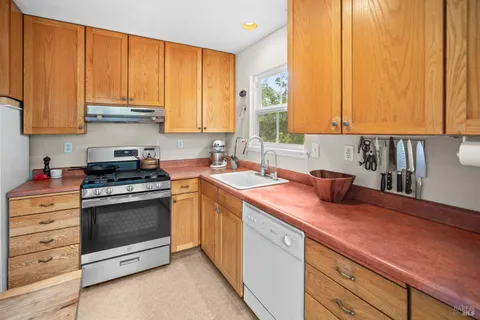 a bedroom with a bed and a table in it