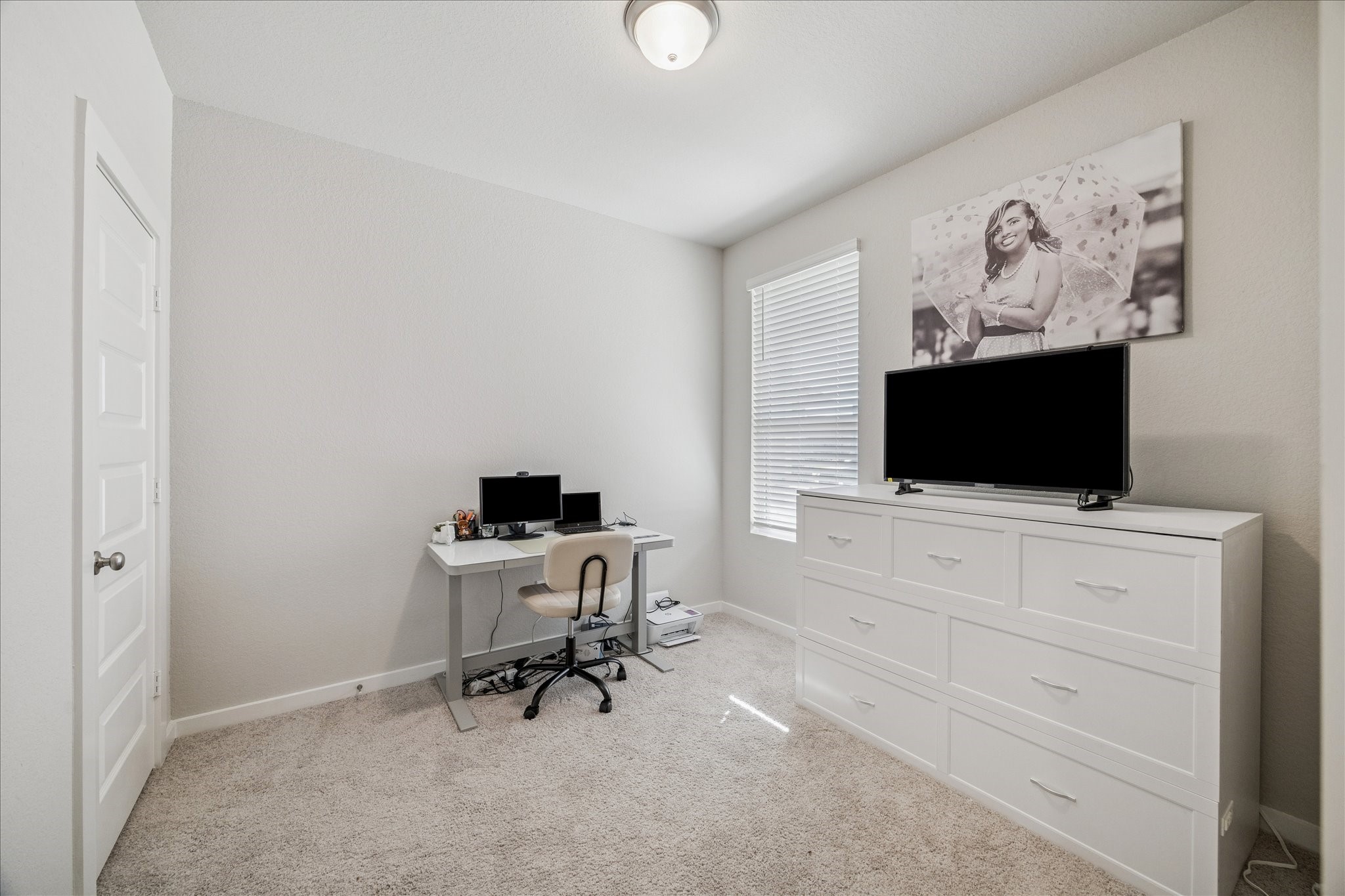 5547 Madden Lane Houston, TX 77048 - Photo 11 of 20 a view of a workspace with furniture