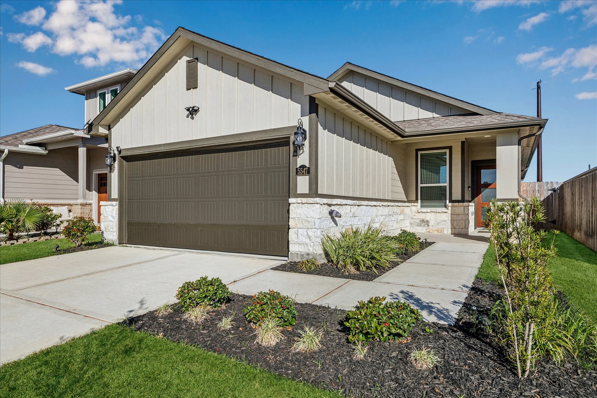 5547 Madden Lane Houston, TX 77048 - Photo 19 of 20 a front view of a house with garden