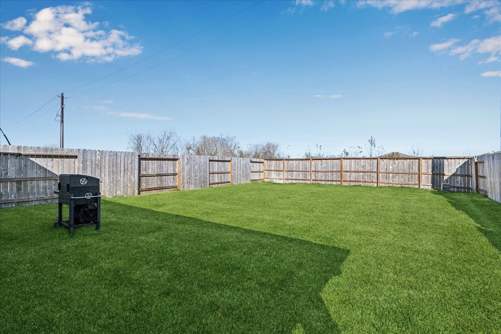 5547 Madden Lane Houston, TX 77048 - Photo 20 of 20 a view of a backyard with a garden