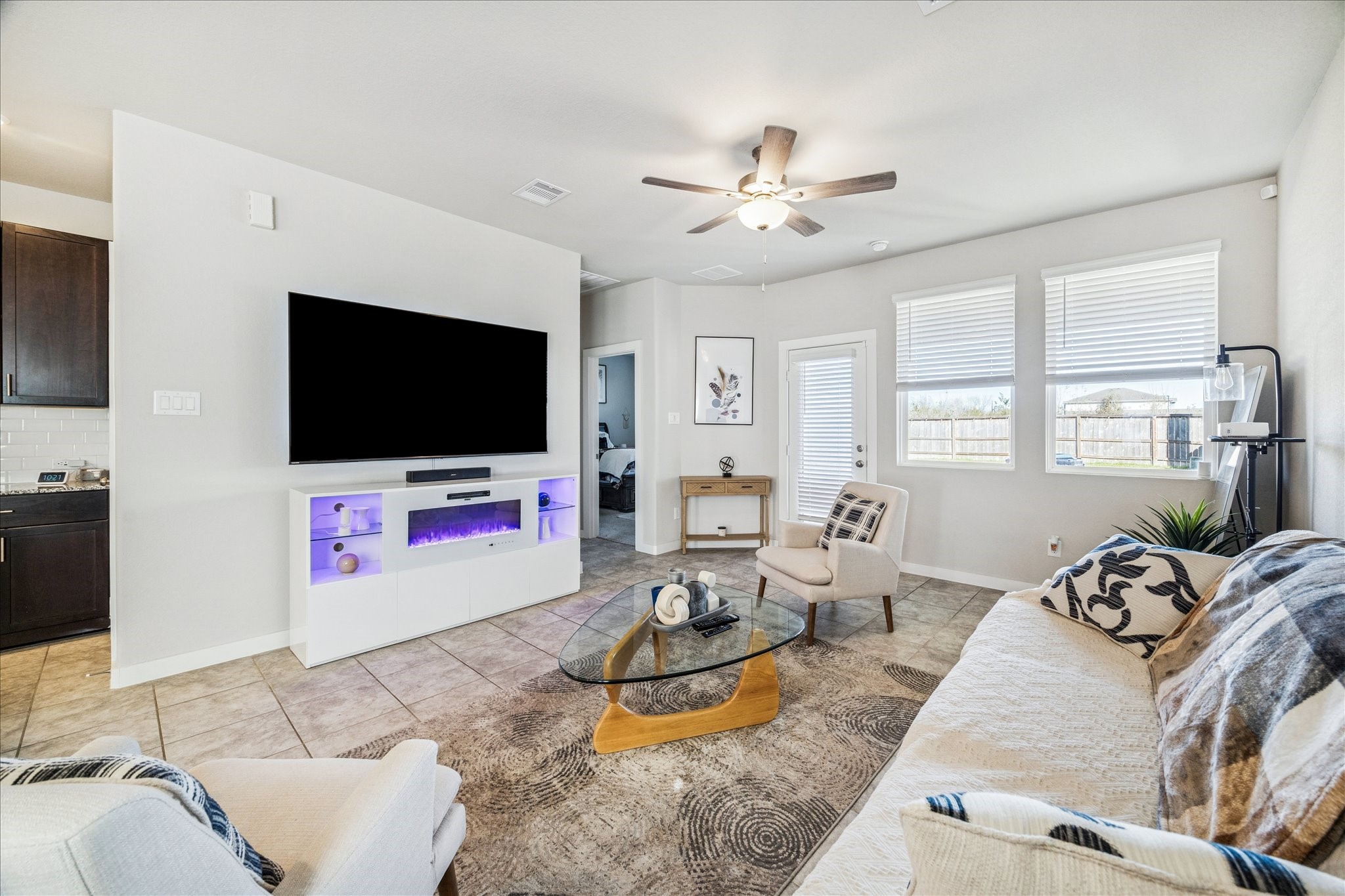 5547 Madden Lane Houston, TX 77048 - Photo 6 of 20 a living room with furniture and a flat screen tv