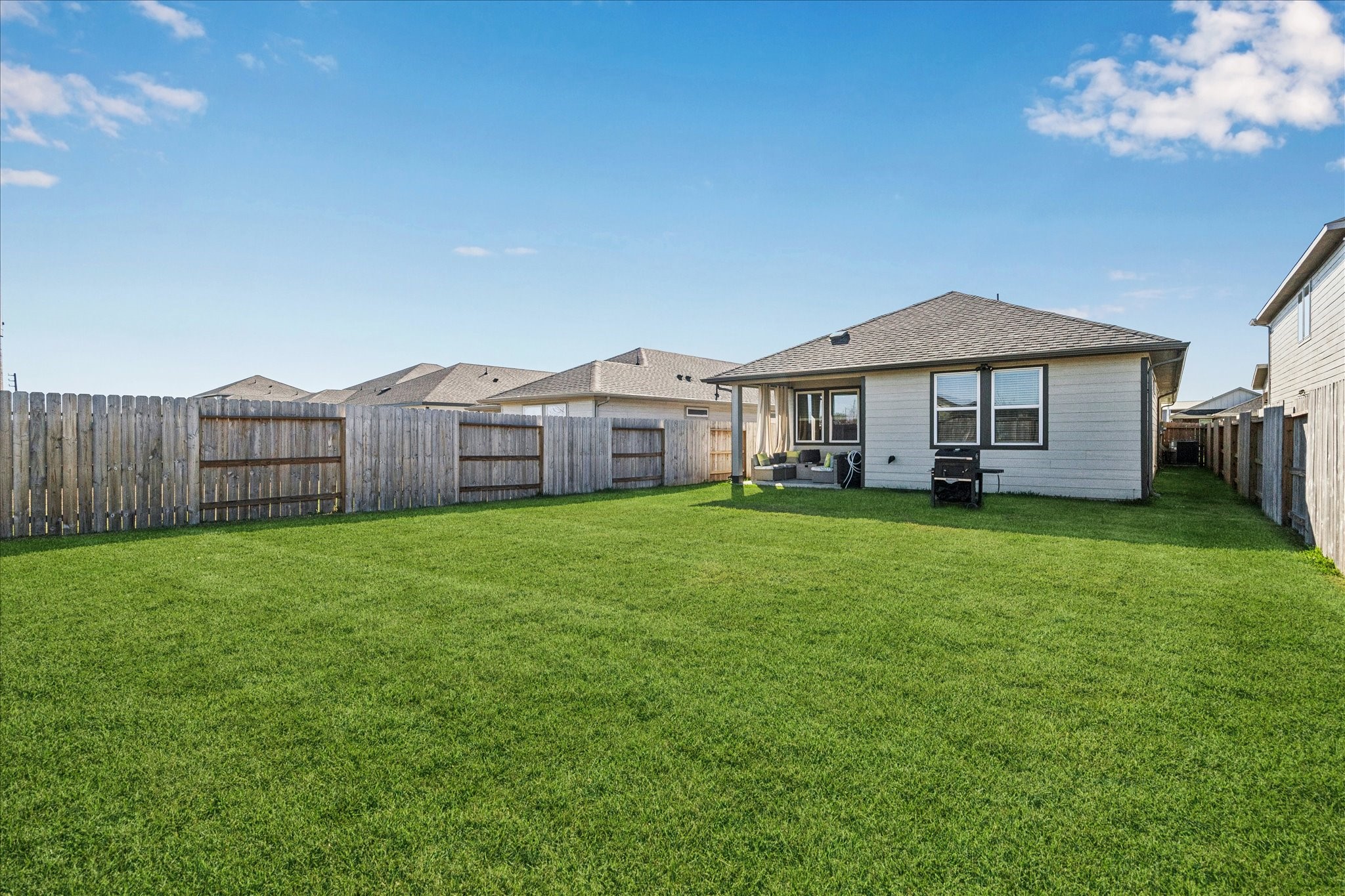 5547 Madden Lane Houston, TX 77048 - Photo 7 of 20 a view of a house with a backyard