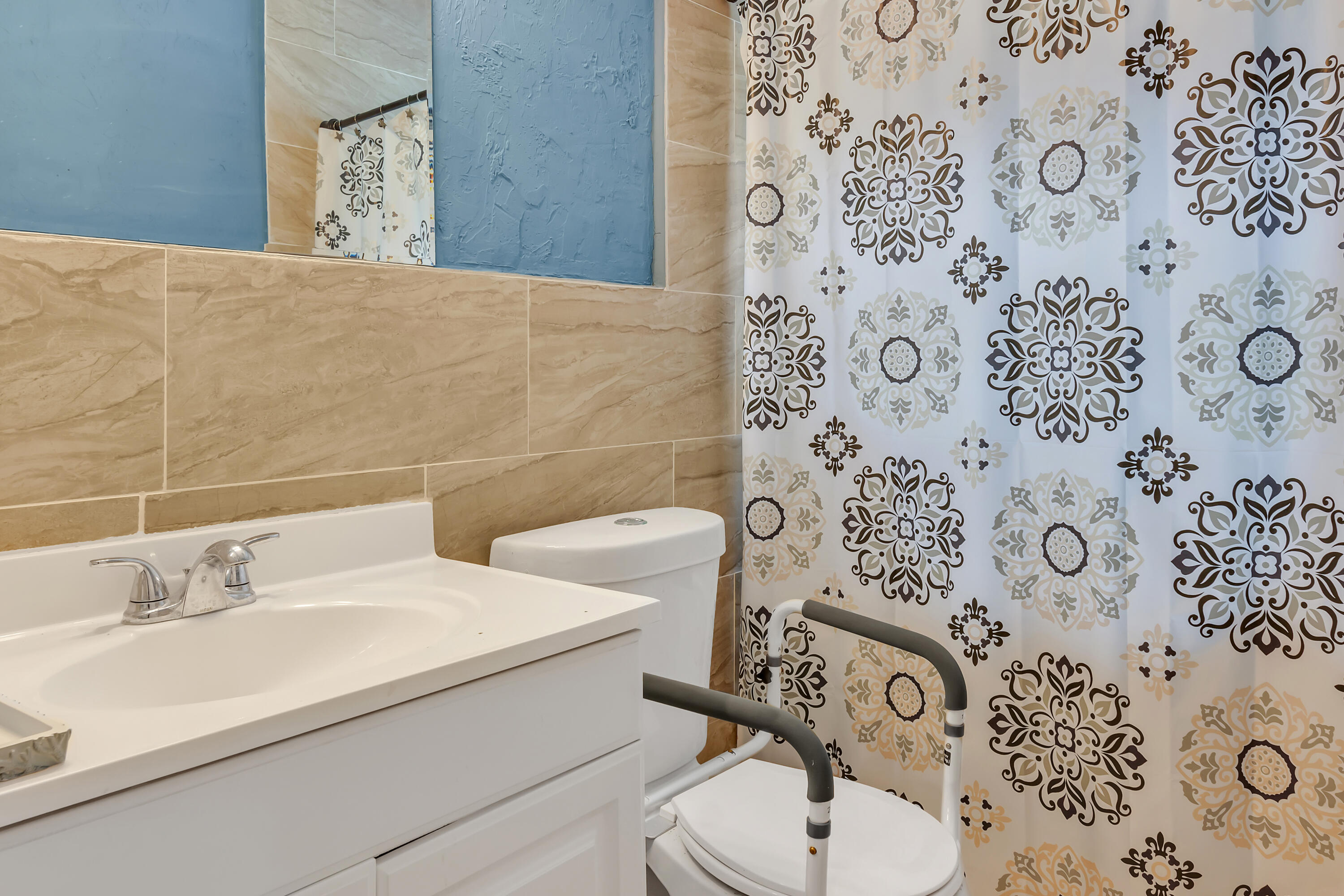 4340 Wilkinson Drive Lake Worth, FL 33461 - Photo 11 of 12 a bathroom with a sink and toilet