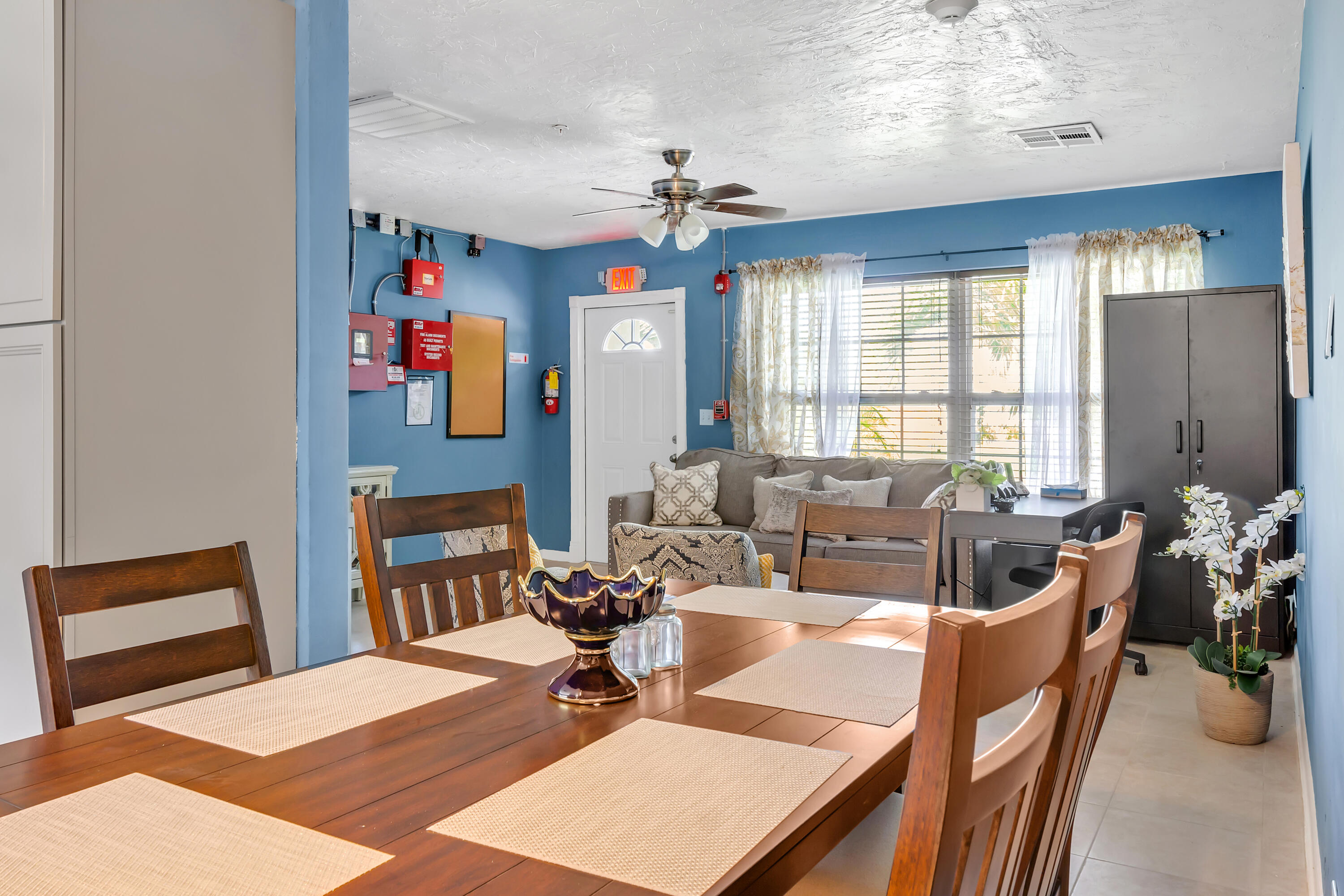 4340 Wilkinson Drive Lake Worth, FL 33461 - Photo 5 of 12 a view of a dining room with furniture