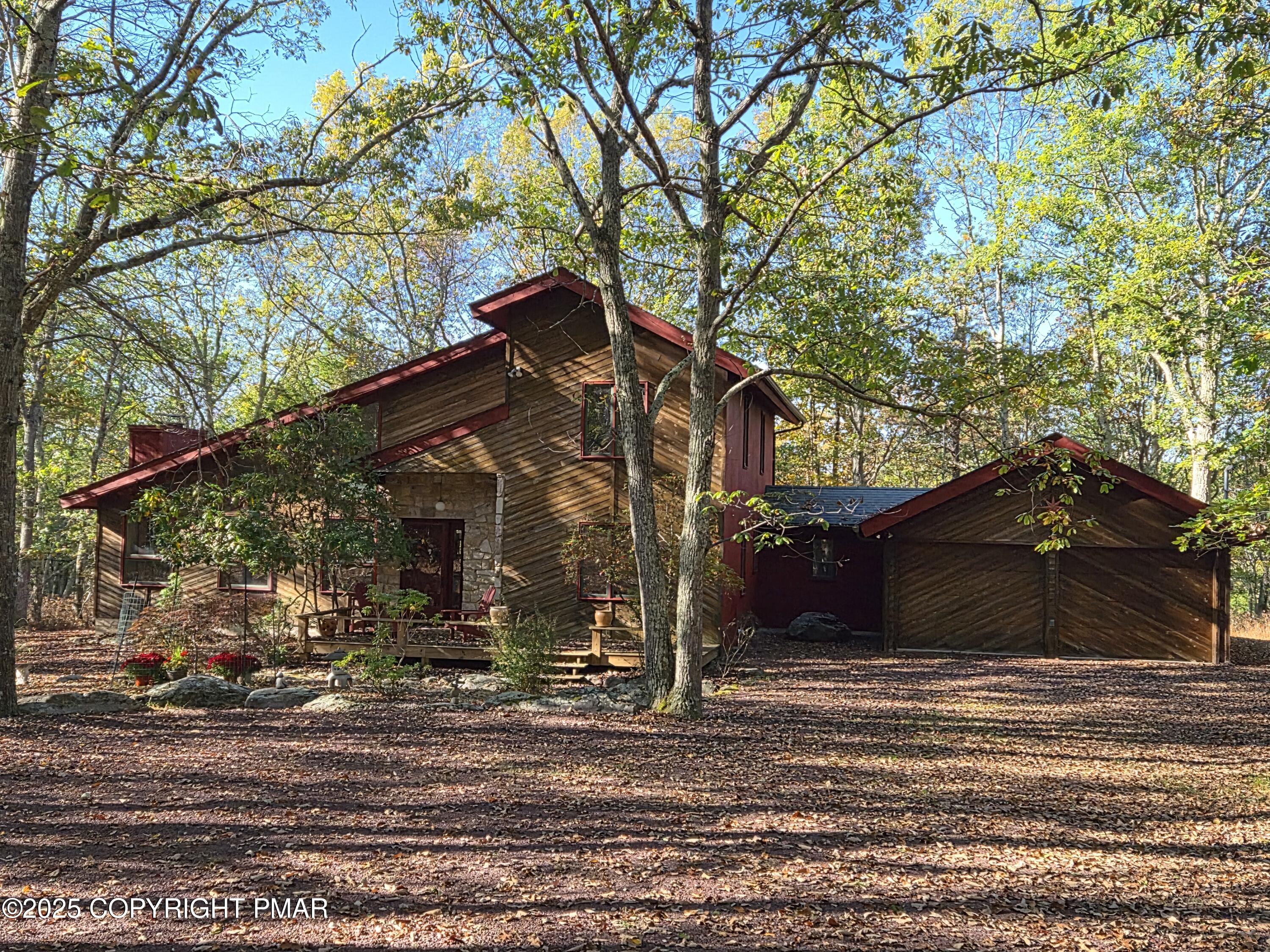 297 Forest Drive Canadensis, PA 18325 - Photo 1 of 58 a front view of a house
