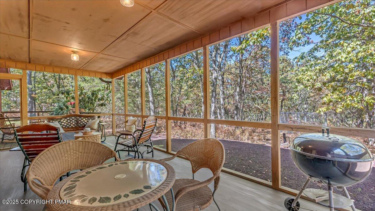297 Forest Drive Canadensis, PA 18325 - Photo 17 of 58 a view of a dining room with furniture window and outside view