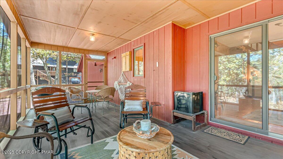 297 Forest Drive Canadensis, PA 18325 - Photo 20 of 58 a outdoor living space with furniture and a potted plant