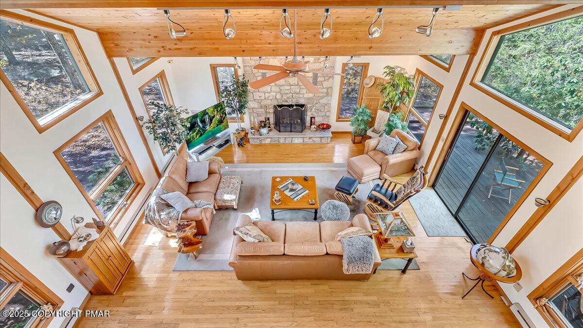 297 Forest Drive Canadensis, PA 18325 - Photo 26 of 58 a view of living room with furniture and floor to ceiling windows