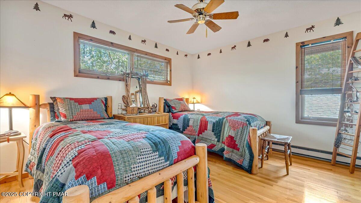 297 Forest Drive Canadensis, PA 18325 - Photo 31 of 58 a bedroom with bed and a window