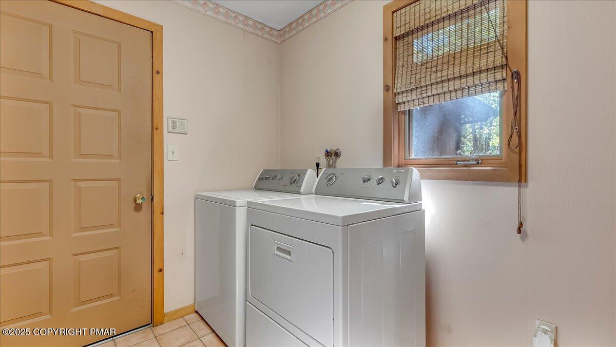 297 Forest Drive Canadensis, PA 18325 - Photo 34 of 58 a utility room with a sink dryer and washer