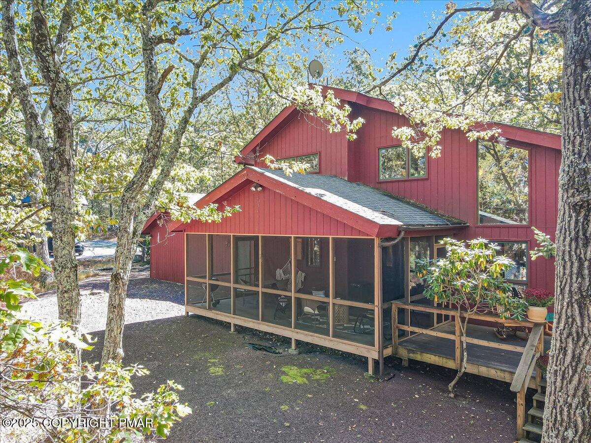 297 Forest Drive Canadensis, PA 18325 - Photo 41 of 58 a front view of a house with a yard