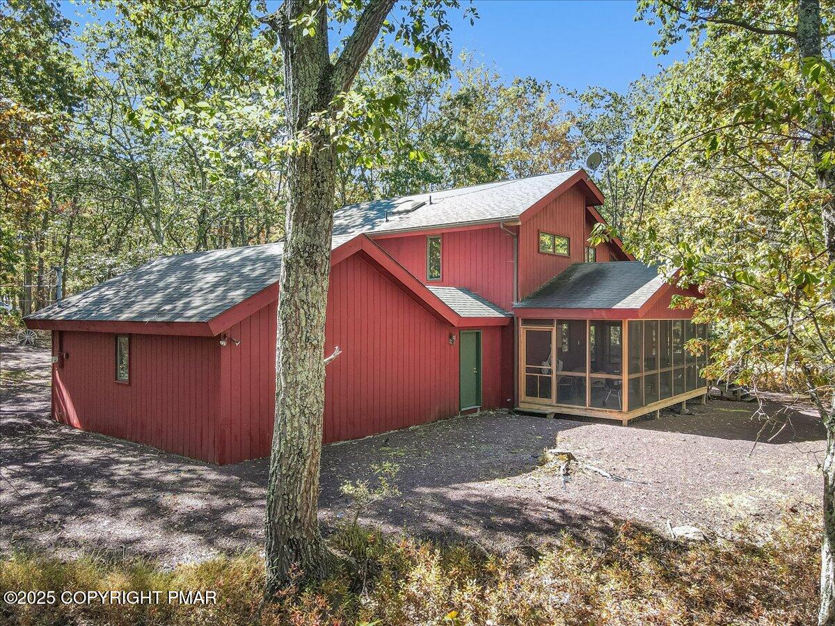 297 Forest Drive Canadensis, PA 18325 - Photo 42 of 58 front view of a house with a yard