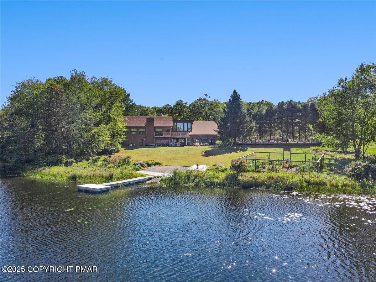 297 Forest Drive Canadensis, PA 18325 - Photo 48 of 58 a view of a lake with houses